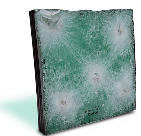 A thick glass panel with multiple visible impact points and cracks is shown, demonstrating resistance to penetration.