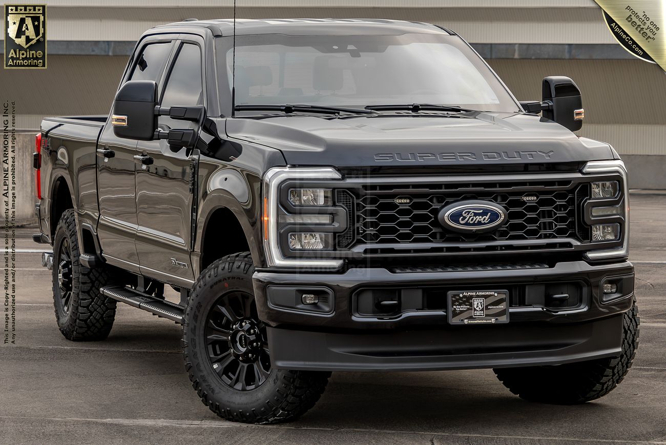 A black Ford F-350 Super Duty pickup truck shown from the front left angle.