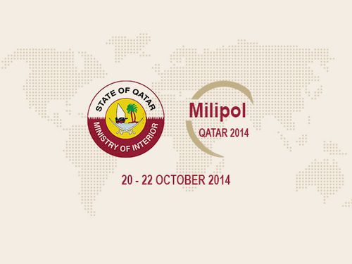 Milipol Qatar 2014 logo with the State of Qatar Ministry of Interior emblem and event dates, October 20-22, 2014, over a world map background.